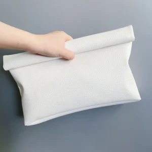 Women's leather rolled edge handbag