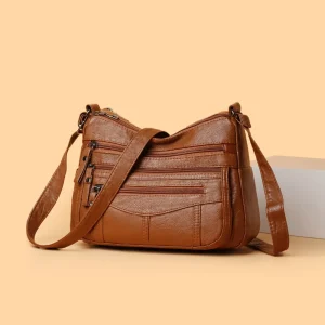 Multi compartment crossbody shoulder bag